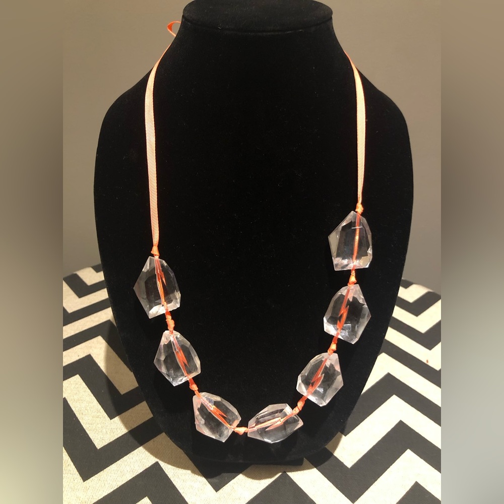 Funky clear beaded necklace with orange tie